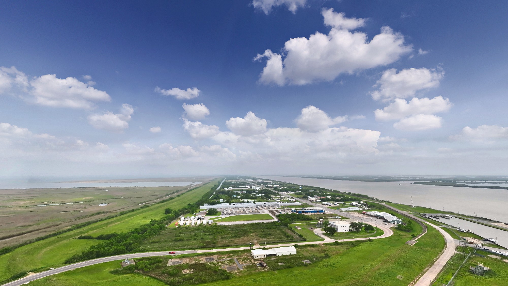 Aerial 360° view over the Venice Port Complex, looking down the Mississippi toward the Gulf.